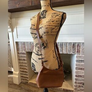 Small tan coach crossbody